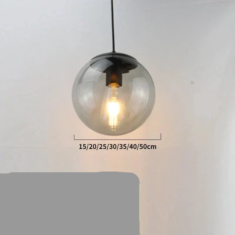 Moderne Pendelleuchte aus goldenem Metall und Glas – Oréclat