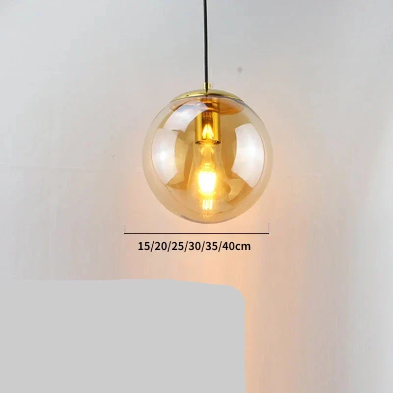 Moderne Pendelleuchte aus goldenem Metall und Glas – Oréclat