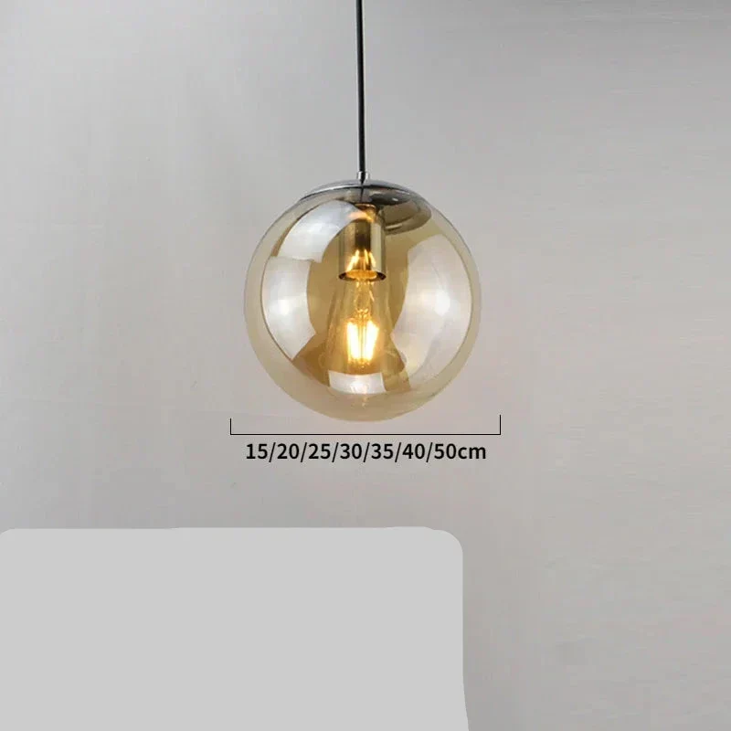 Moderne Pendelleuchte aus goldenem Metall und Glas – Oréclat