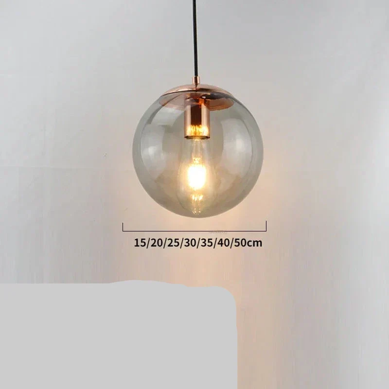 Moderne Pendelleuchte aus goldenem Metall und Glas – Oréclat
