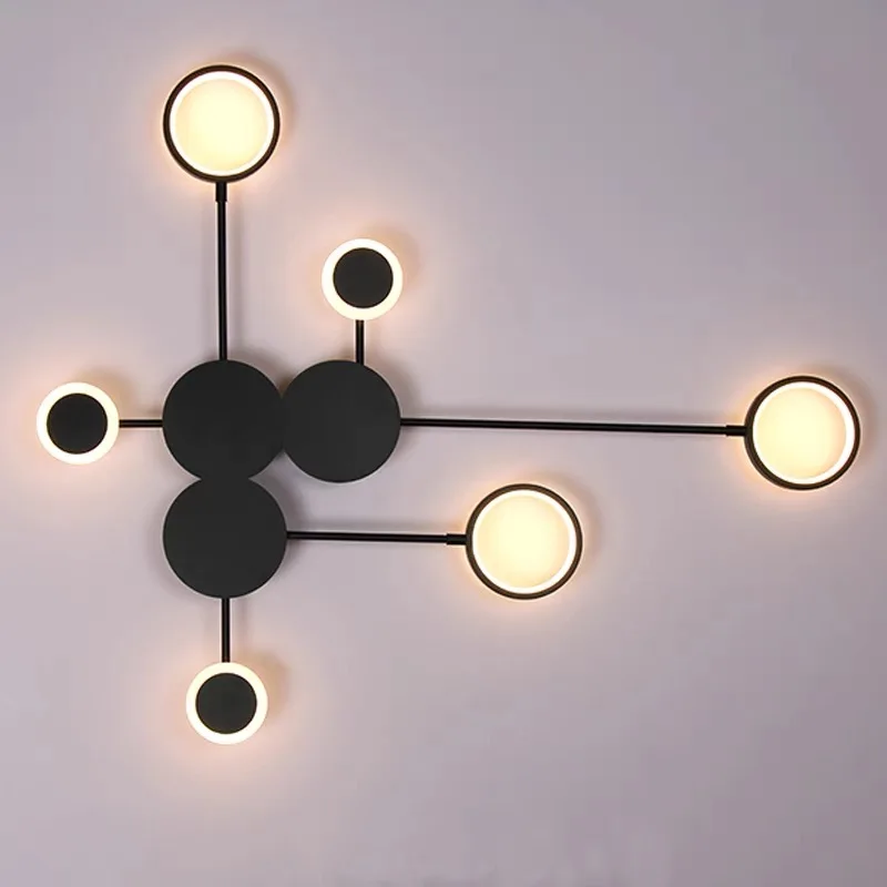 Moderne schwarze Wandleuchte aus Eisen für Wohnzimmer – Noctario
