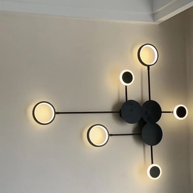 Moderne schwarze Wandleuchte aus Eisen für Wohnzimmer – Noctario