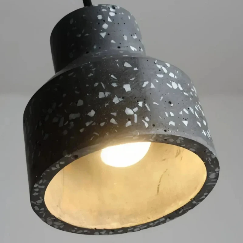 Moderne Pendelleuchte aus Zement fürs Schlafzimmer