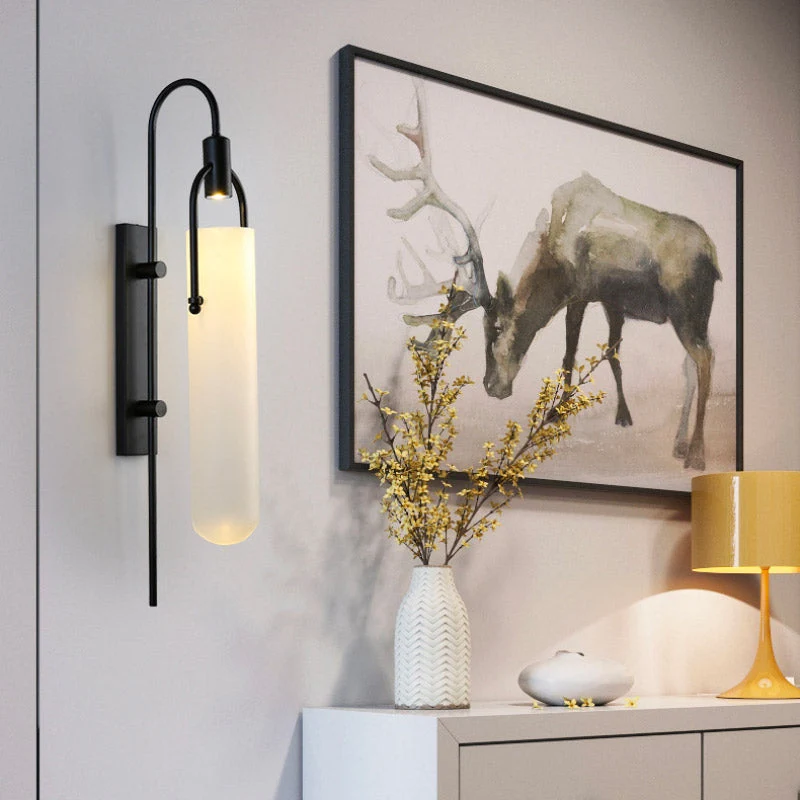 Moderne Wandleuchte in Gold und Schwarz – Estanor