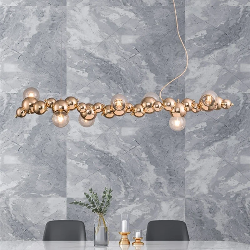 LED-Pendelleuchte aus goldenem Metall mit Blasenglas – Citrona