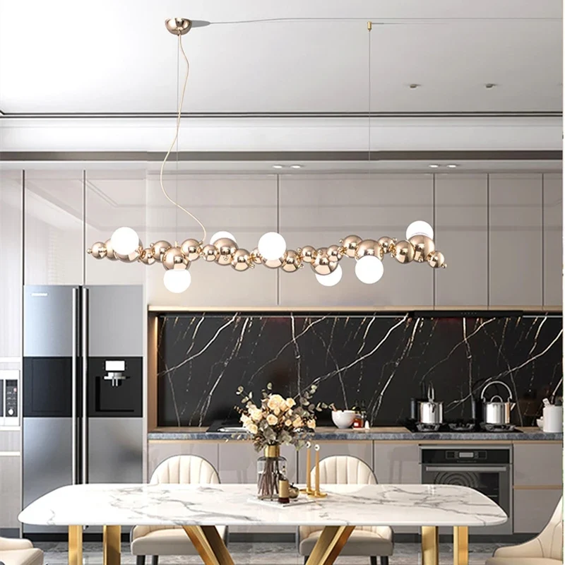 LED-Pendelleuchte aus goldenem Metall mit Blasenglas – Citrona