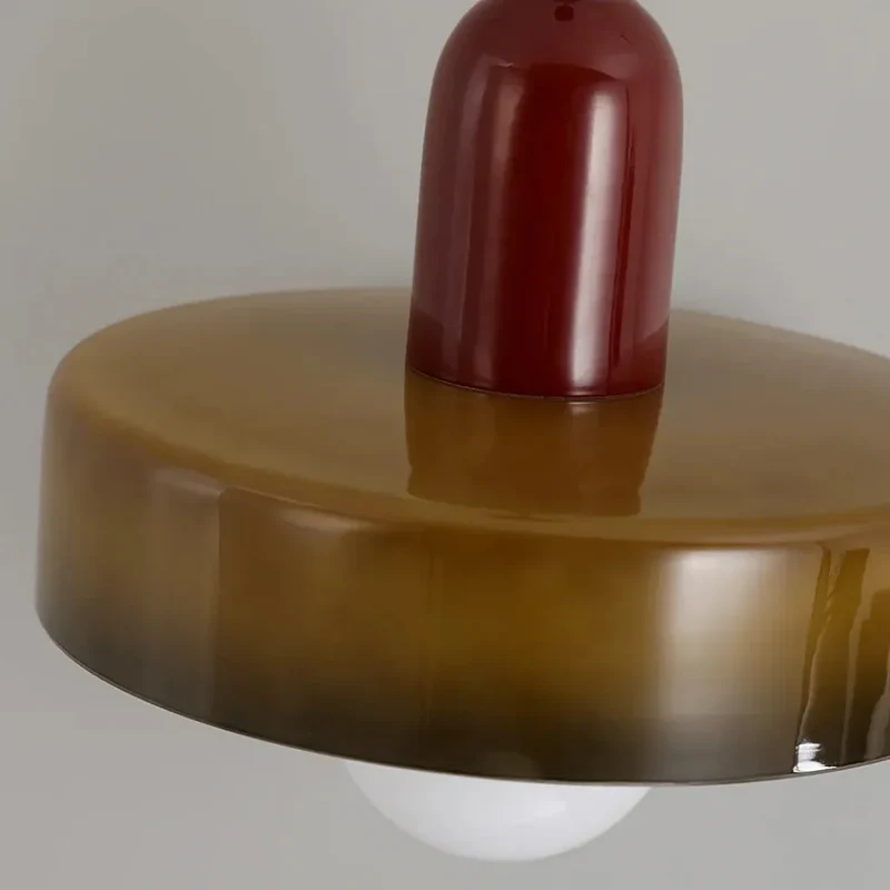 Runde LED Pendelleuchte aus Glas für das Schlafzimmer