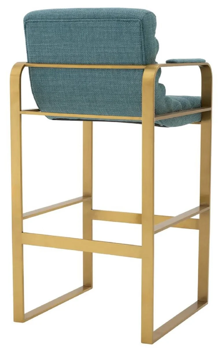 Casa Padrino Luxus Barstuhl mit Armlehnen Blau / Messing 53,5 x 57,5 x H. 107 cm - Gepolsterter Edelstahl Barhocker - Bar Möbel - Luxus Möbel - Luxus Qualität