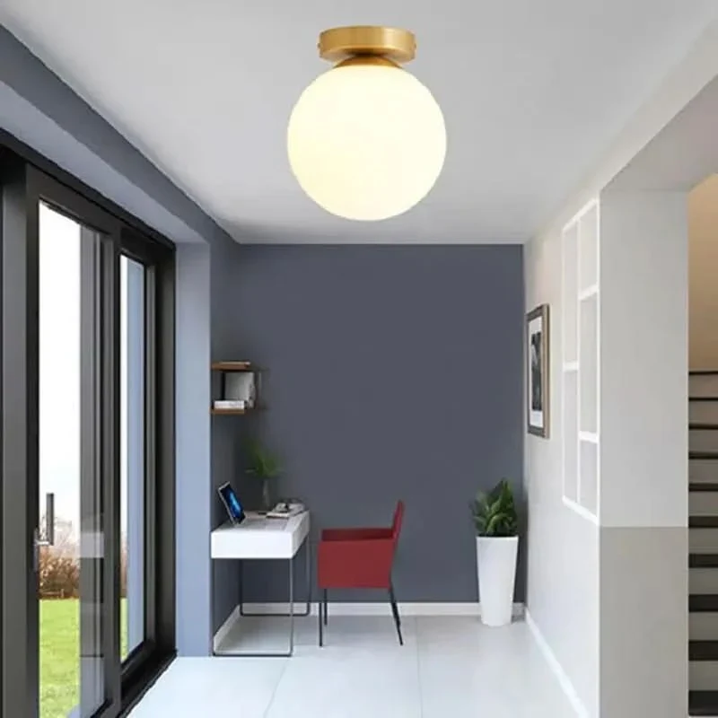 Elegante Deckenleuchte in Gold mit warmem Licht – Élégo