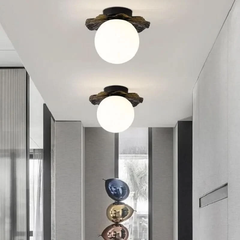 Elegante Deckenleuchte in Gold mit warmem Licht – Élégo