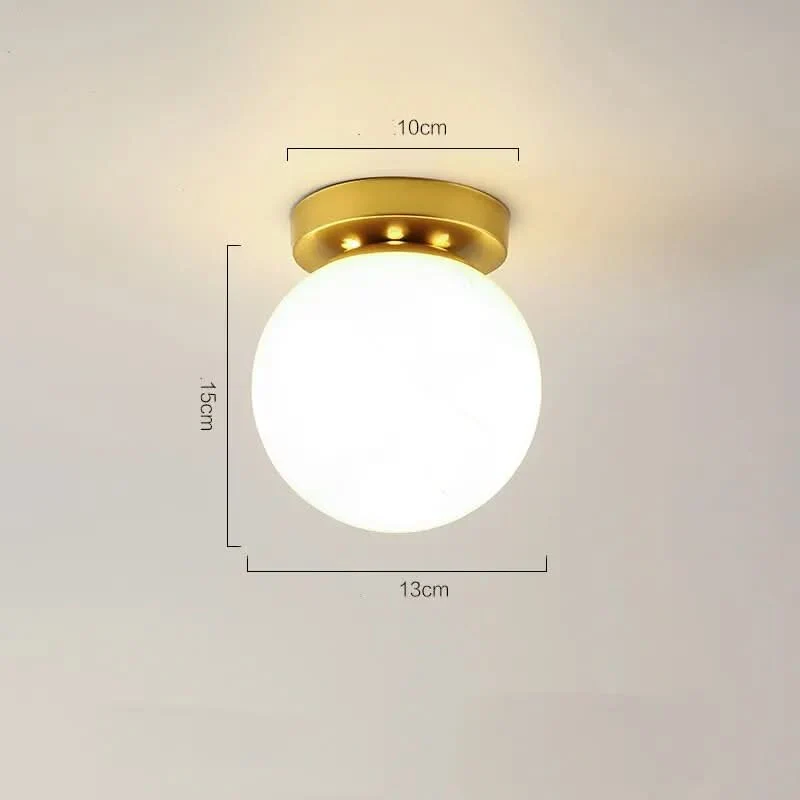 Elegante Deckenleuchte in Gold mit warmem Licht – Élégo
