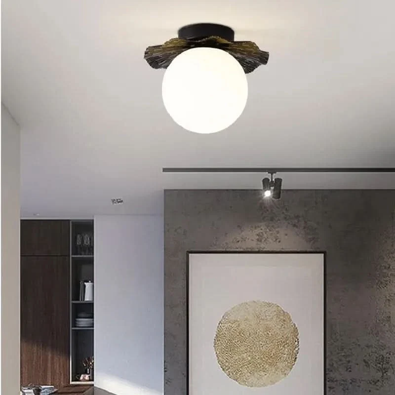 Elegante Deckenleuchte in Gold mit warmem Licht – Élégo