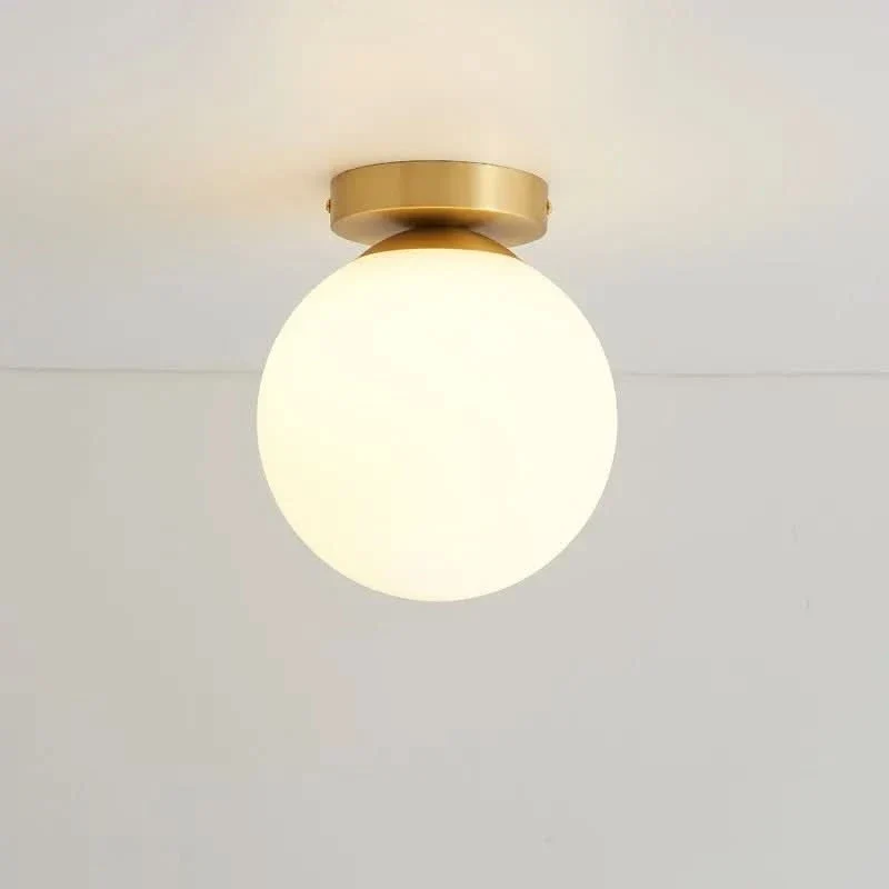 Elegante Deckenleuchte in Gold mit warmem Licht – Élégo