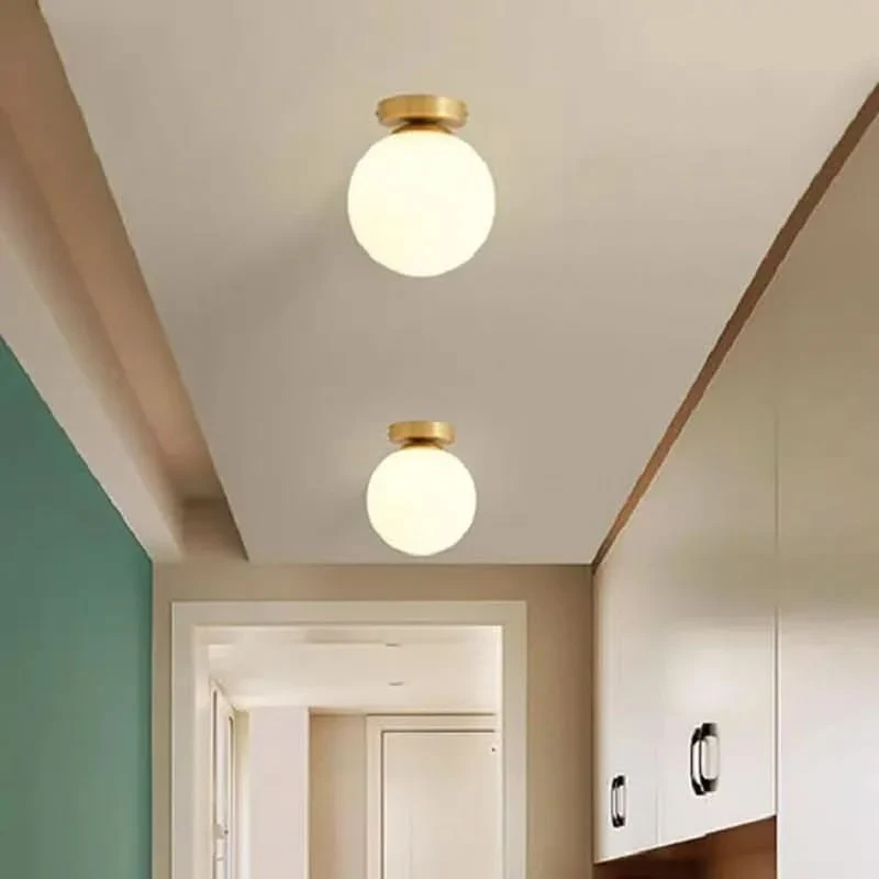Elegante Deckenleuchte in Gold mit warmem Licht – Élégo