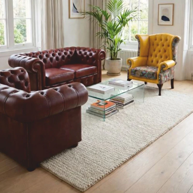 Casa Padrino Luxus Chesterfield Leder Ohrensessel Gelb / Bunt / Dunkelbraun H. 110 cm