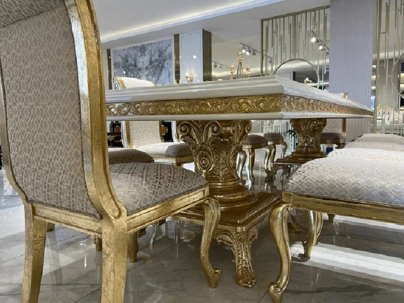 Casa Padrino Luxus Barock Esszimmer Stuhl Gold Muster / Antik Gold H. 105 cm