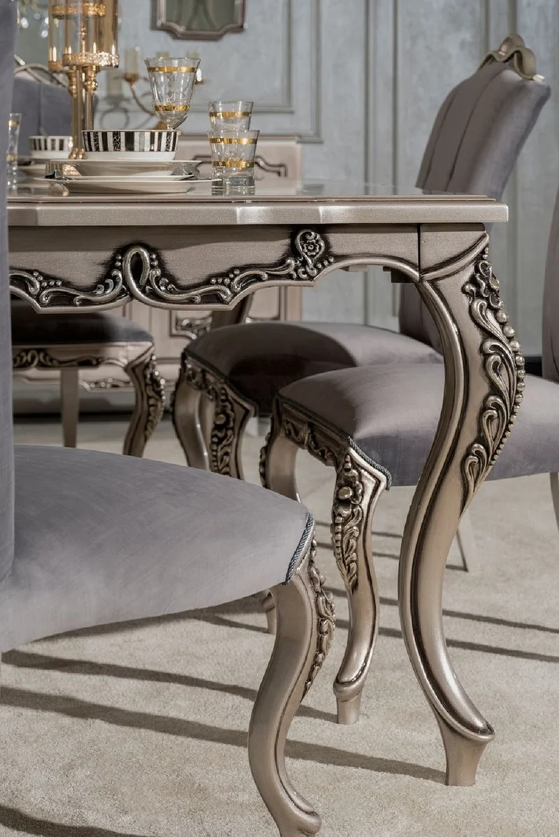 Casa Padrino Luxus Barock Esszimmer Set Grau / Silber - 1 Barock Esstisch & 6 Barock Esszimmerstühle - Luxus Esszimmer Möbel im Barockstil - Prunkvolle Barock Esszimmer Möbel