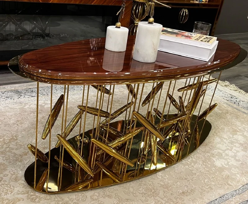 Casa Padrino Luxus Couchtisch Braun / Gold 120 x 51 x H. 47 cm - Ovaler Edelstahl Wohnzimmertisch mit Massivholz Tischplatte - Wohnzimmer Möbel - Hotel Möbel - Luxus Möbel