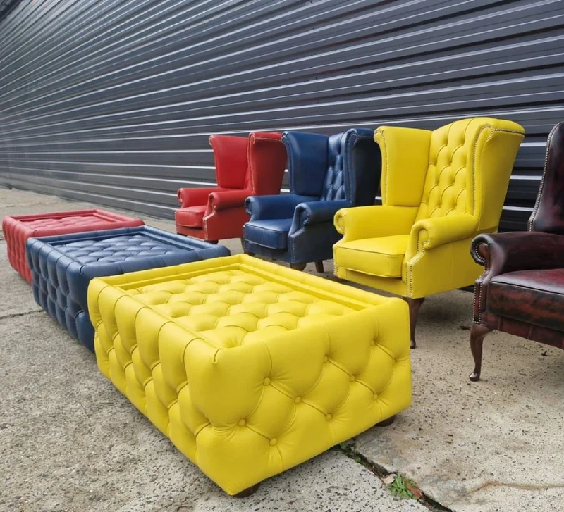 Casa Padrino Luxus Chesterfield Ohrensessel Gelb / Dunkelbraun 98 x 90 x H. 110 cm - Echtleder Chesterfield Wohnzimmer Sessel - Wohnzimmer Möbel - Chesterfield Möbel - Luxus Leder Möbel
