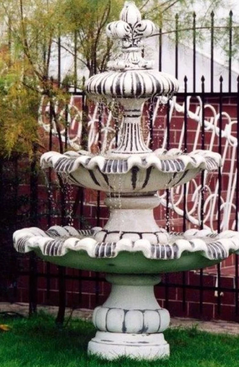 Casa Padrino Barock Springbrunnen mit dekorativer Lilie Weiß / Braun Ø 129 x H. 175 cm - Prunkvoller Gartenbrunnen im Barockstil - Runder Gartendeko Stein Brunnen - Barock Garten Deko Accessoires