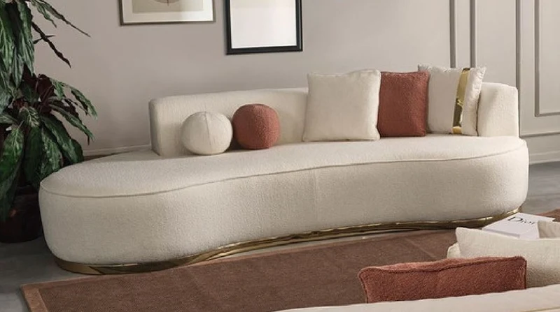Casa Padrino Luxus Sofa Creme / Gold 270 x 120 x H. 76 cm - Gebogenes Wohnzimmer Sofa - Hotel Sofa - Wohnzimmer Möbel - Hotel Möbel - Luxus Möbel - Luxus Einrichtung - Wohnzimmer Einrichtung