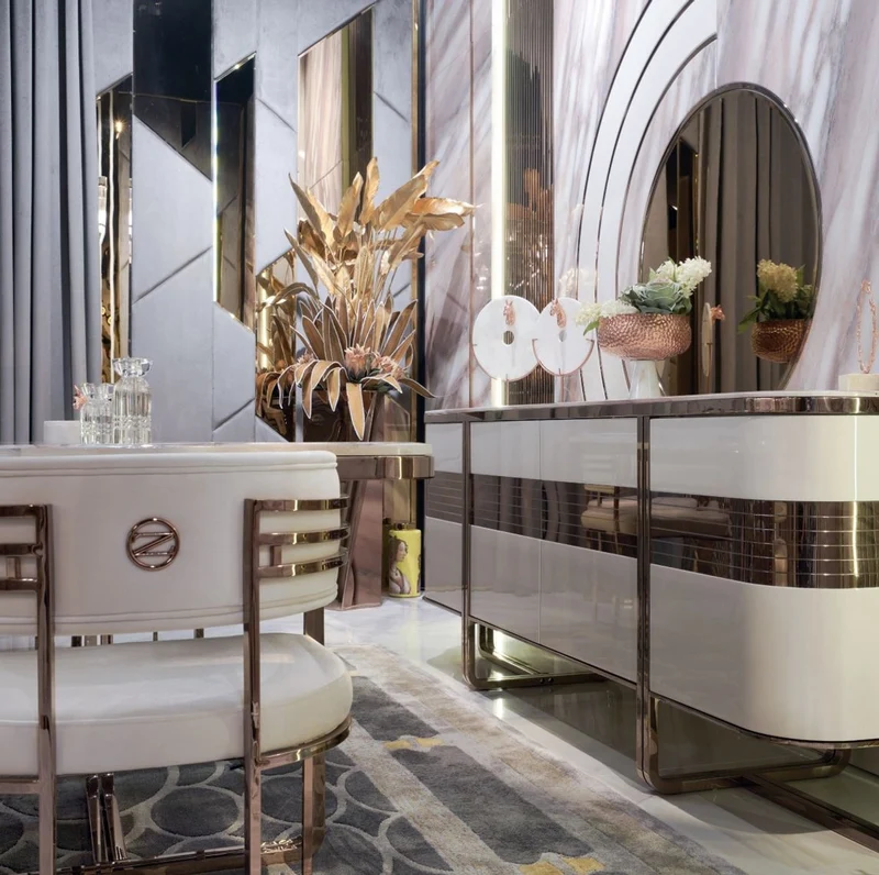 Casa Padrino Luxus Esszimmer Set Creme / Weiß / Kupfer - 1 Luxus Esstisch mit Kunstmarmor Tischplatte & 8 Luxus Esszimmer Stühle - Esszimmer Möbel - Luxus Möbel - Luxus Einrichtung