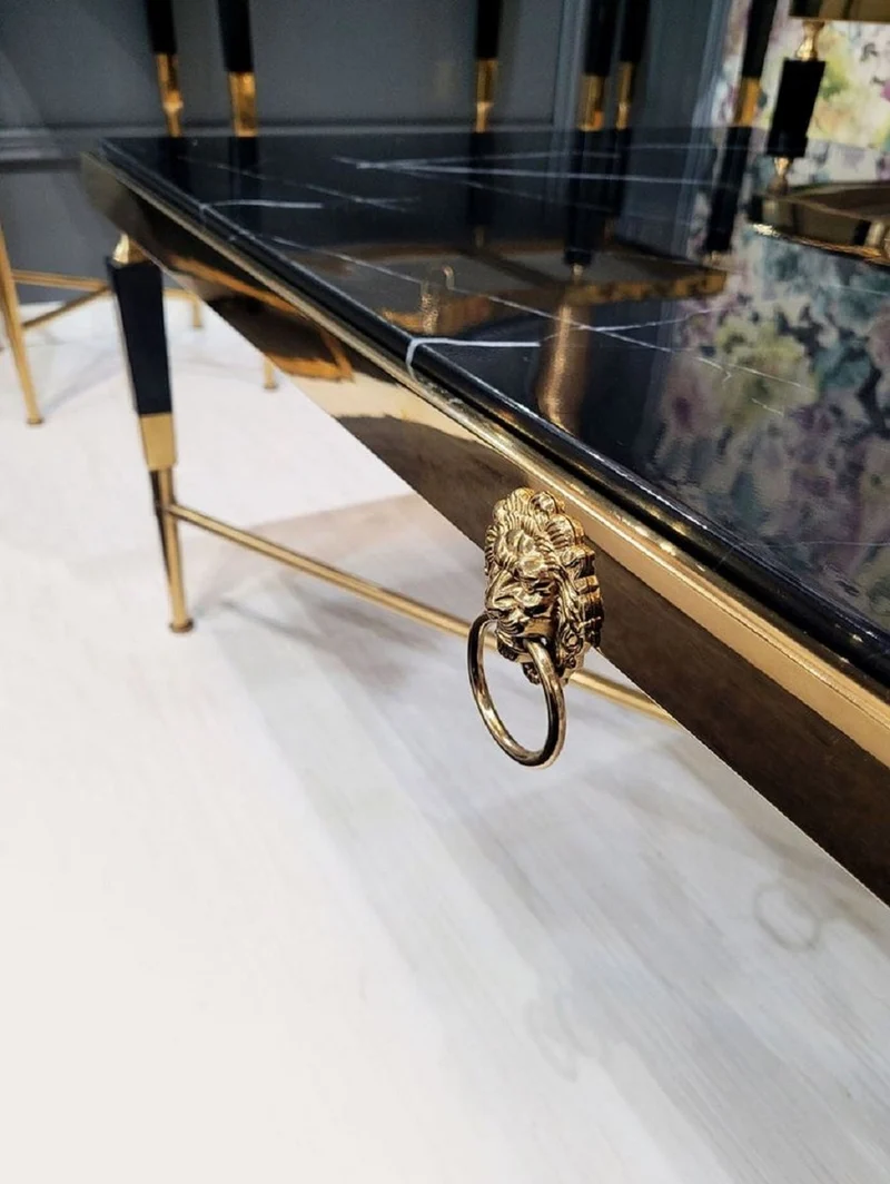 Casa Padrino Luxus Couchtisch Schwarz / Gold 130 x 70 x H. 45 cm - Wohnzimmertisch mit Kunstmarmor Tischplatte - Luxus Wohnzimmer Möbel - Hotel Möbel - Luxus Einrichtung - Hotel Einrichtung