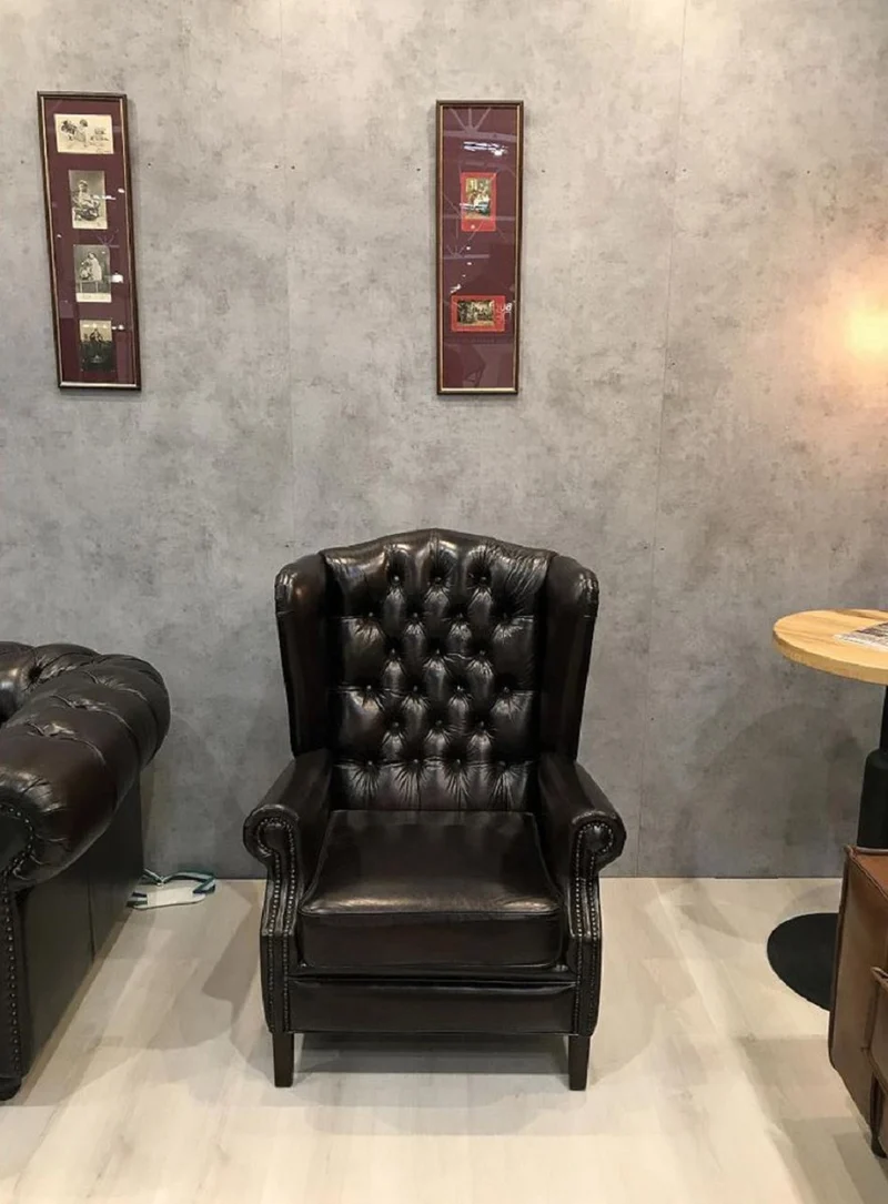 Casa Padrino Luxus Chesterfield Leder Ohrensessel Schwarz - Chesterfield Echtleder Wohnzimmer Sessel - Wohnzimmer Möbel - Chesterfield Möbel - Echtleder Möbel - Luxus Möbel - Luxus Einrichtung
