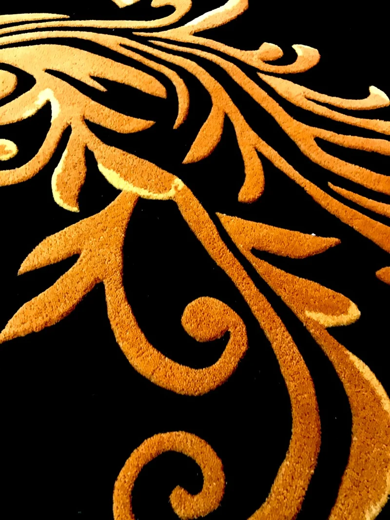 Pompöös by Casa Padrino Luxus Teppich von Harald Glööckler 160 x 230 cm Krone Schwarz / Gold - Barock Design Teppich - Handgewebt aus Wolle