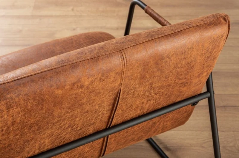 Casa Padrino Retro Lounge Sessel Vintage Hellbraun / Schwarz 71 x 72 x H. 79 cm - Kunstleder Sessel mit Metallgestell - Wohnzimmer Möbel