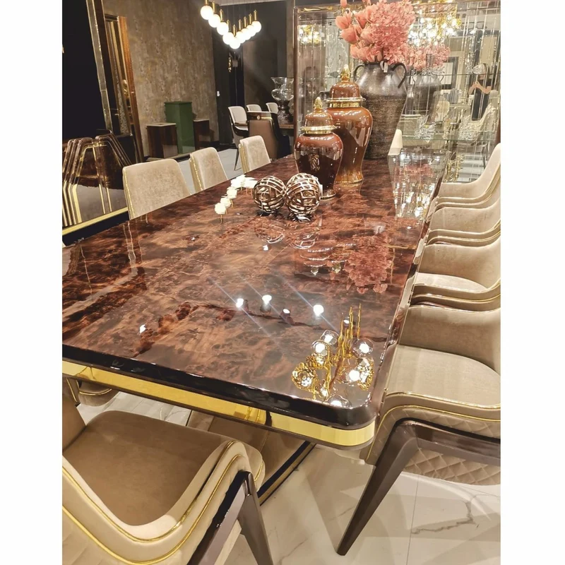 Casa Padrino Luxus Art Deco Esszimmer Stuhl mit Armlehnen Beige / Dunkelbraun / Gold