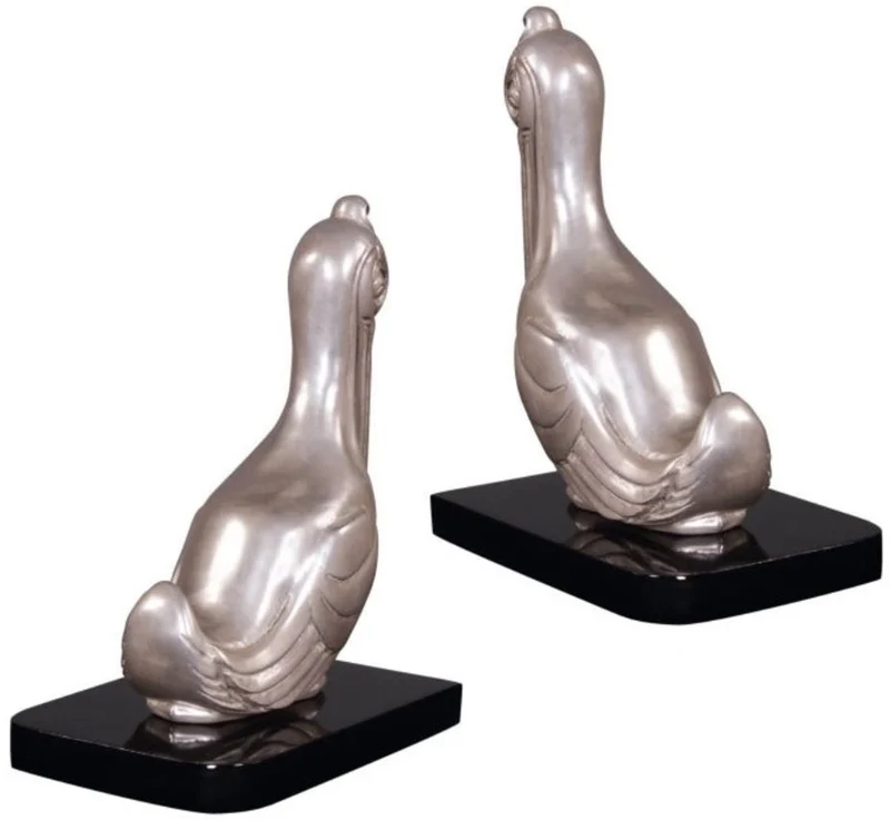 Casa Padrino Luxus Buchstützen Set Pelikane Silber / Schwarz 18 x 12 x H. 22 cm - Versilberte Deko Bronzefiguren mit Holzsockel