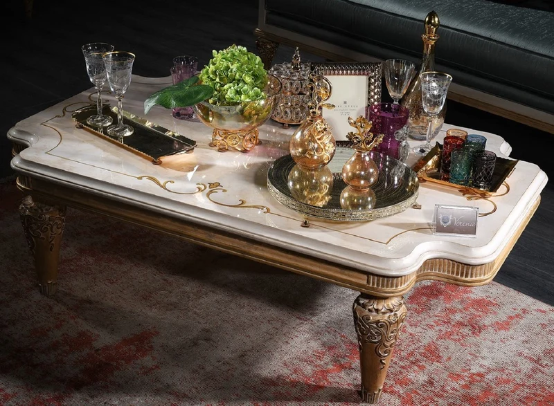 Casa Padrino Luxus Barock Wohnzimmertisch Weiß / Gold 140 x 90 x H. 42 cm - Barock Couchtisch